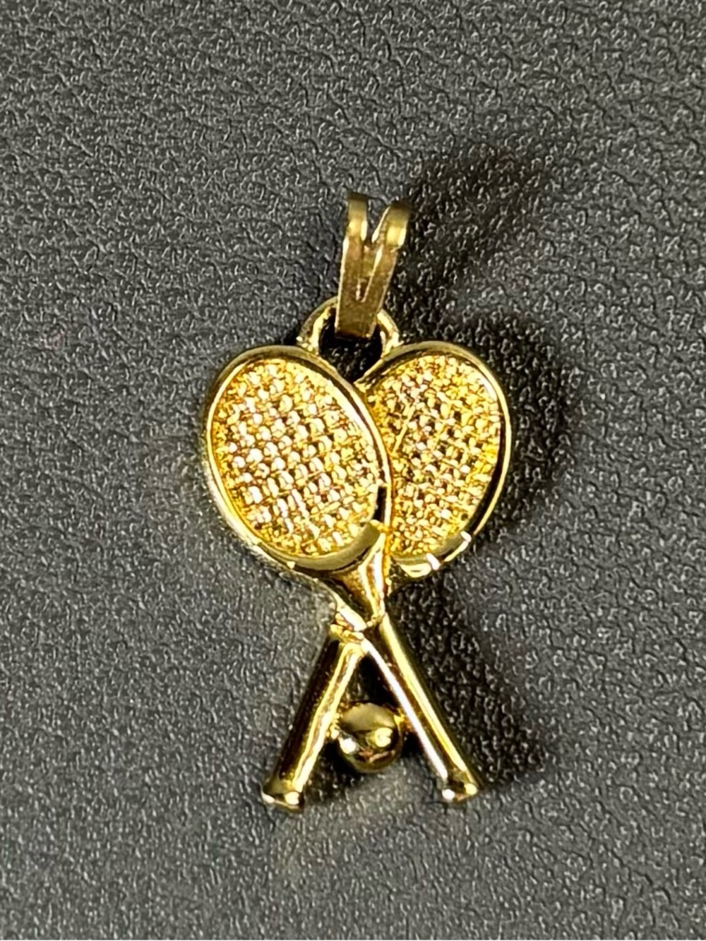 Vintage early ‘80’s Monet Gold Tone Tennis Charm